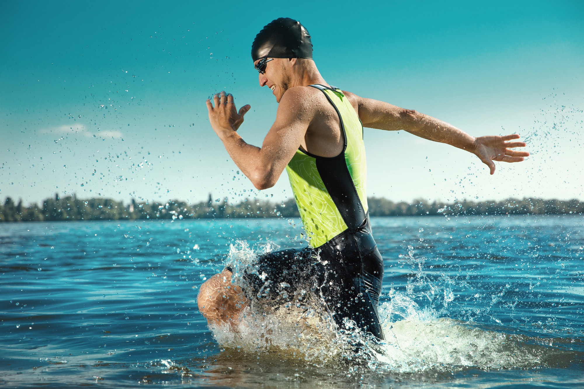 Professional triathlete swimming in river's open water