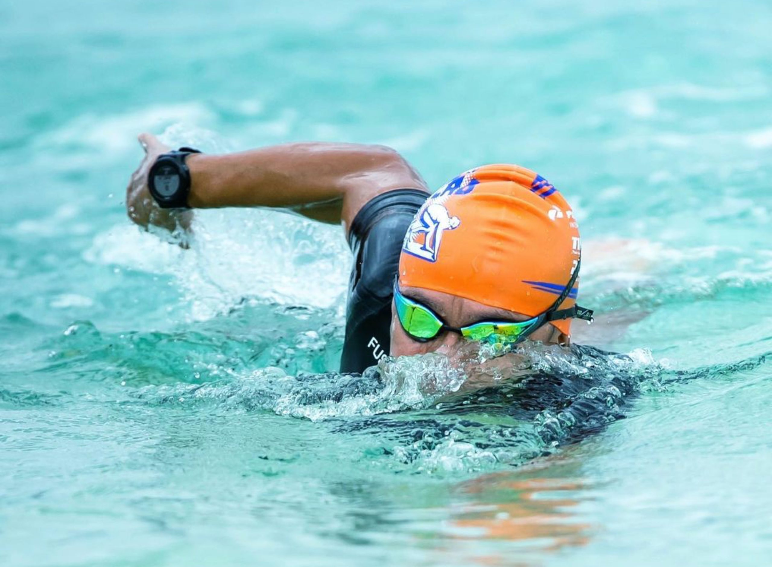 Elite Swimmer and Coach Mike Trees shares 5 key skills to help increase your speed while swimming in open water